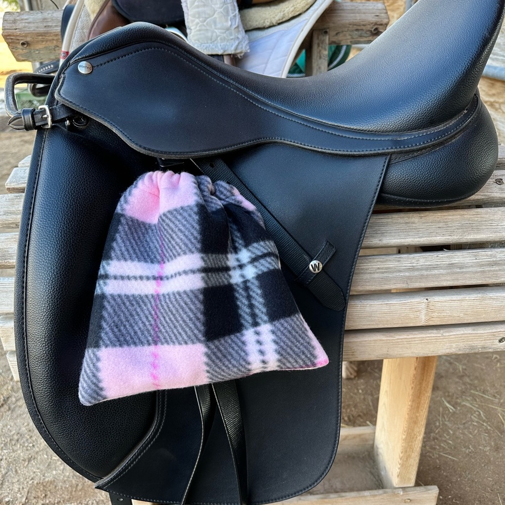 Pink plaid stirrup covers